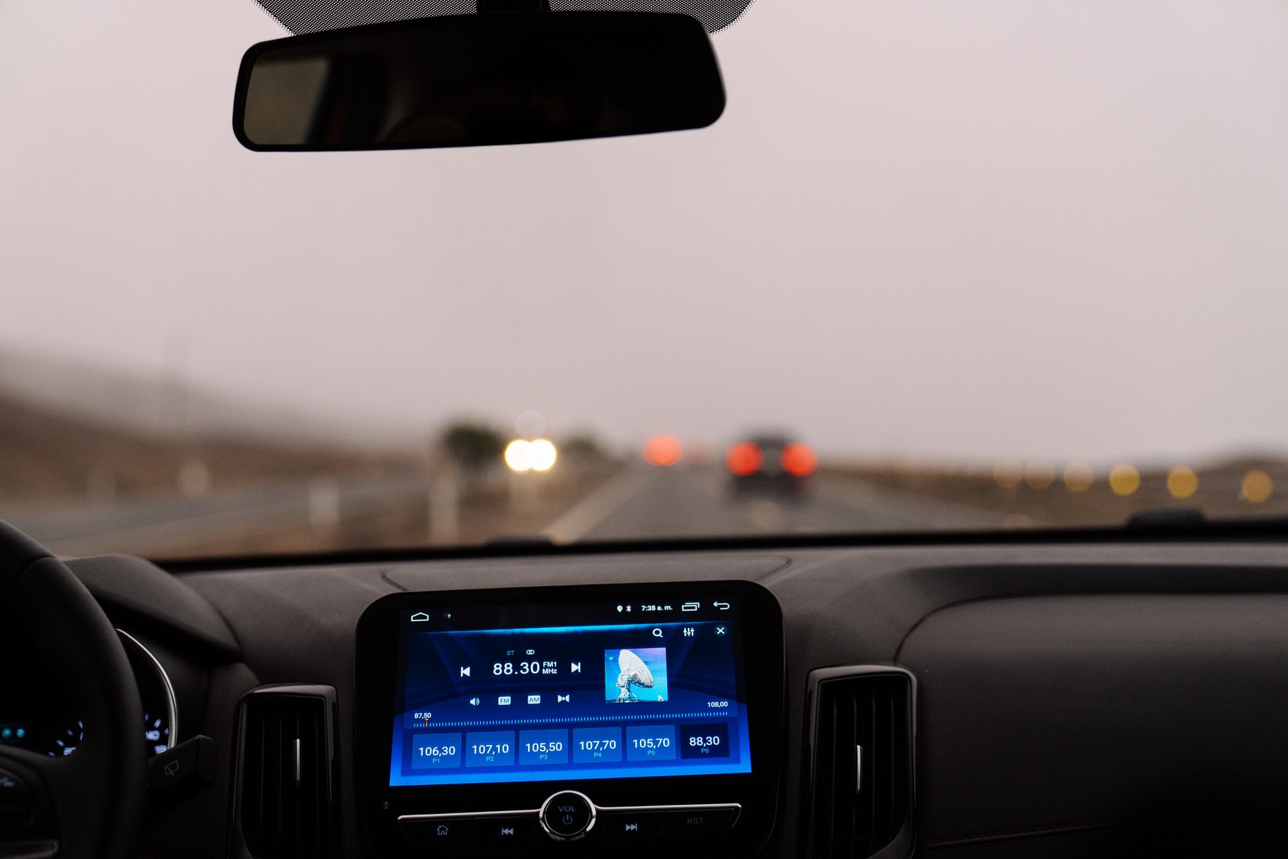 Adaptive cruise control display in a long-distance motorway car interior