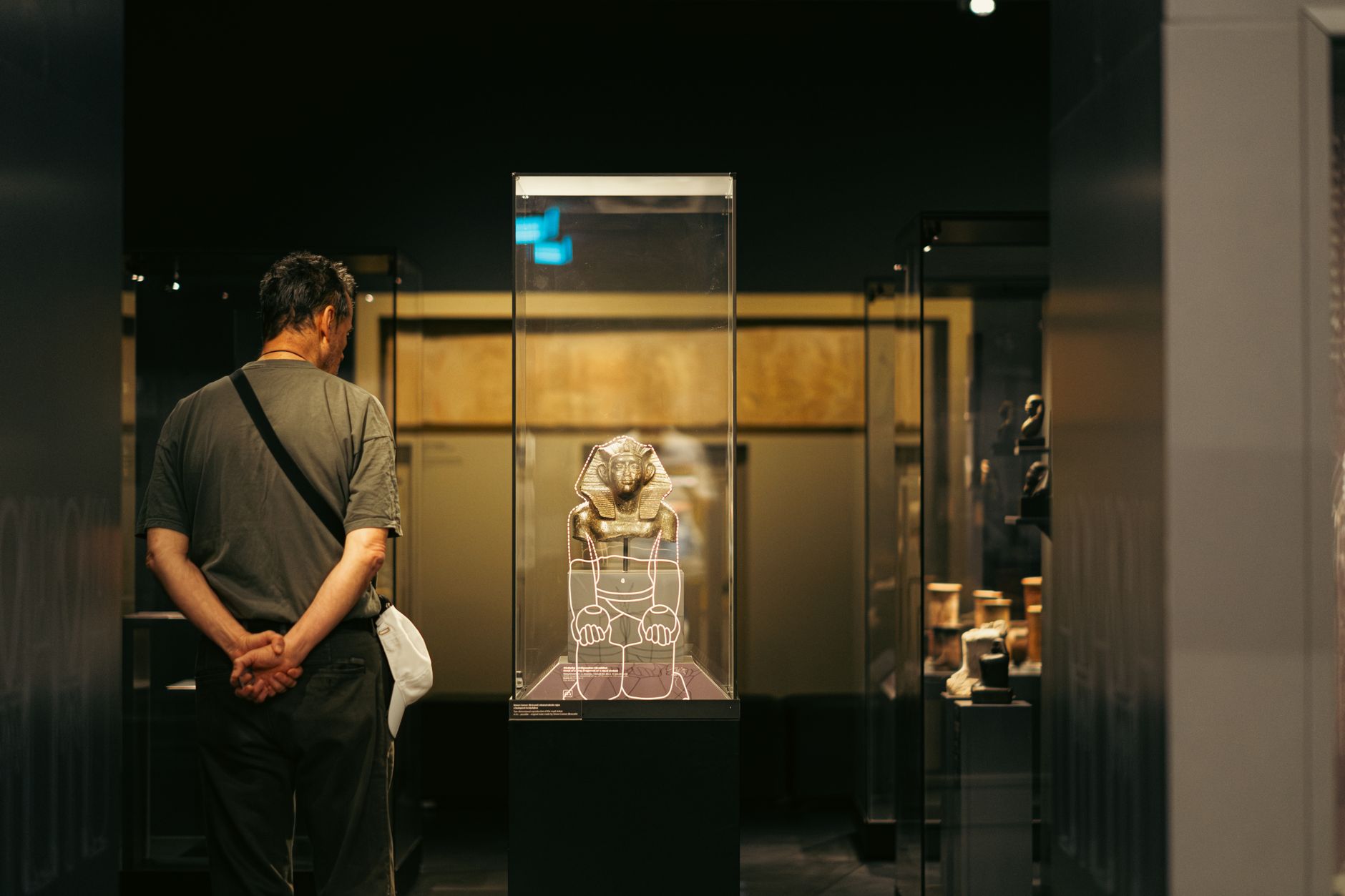 Museum display case with historic artefacts highlighting hidden collections in UK free museums