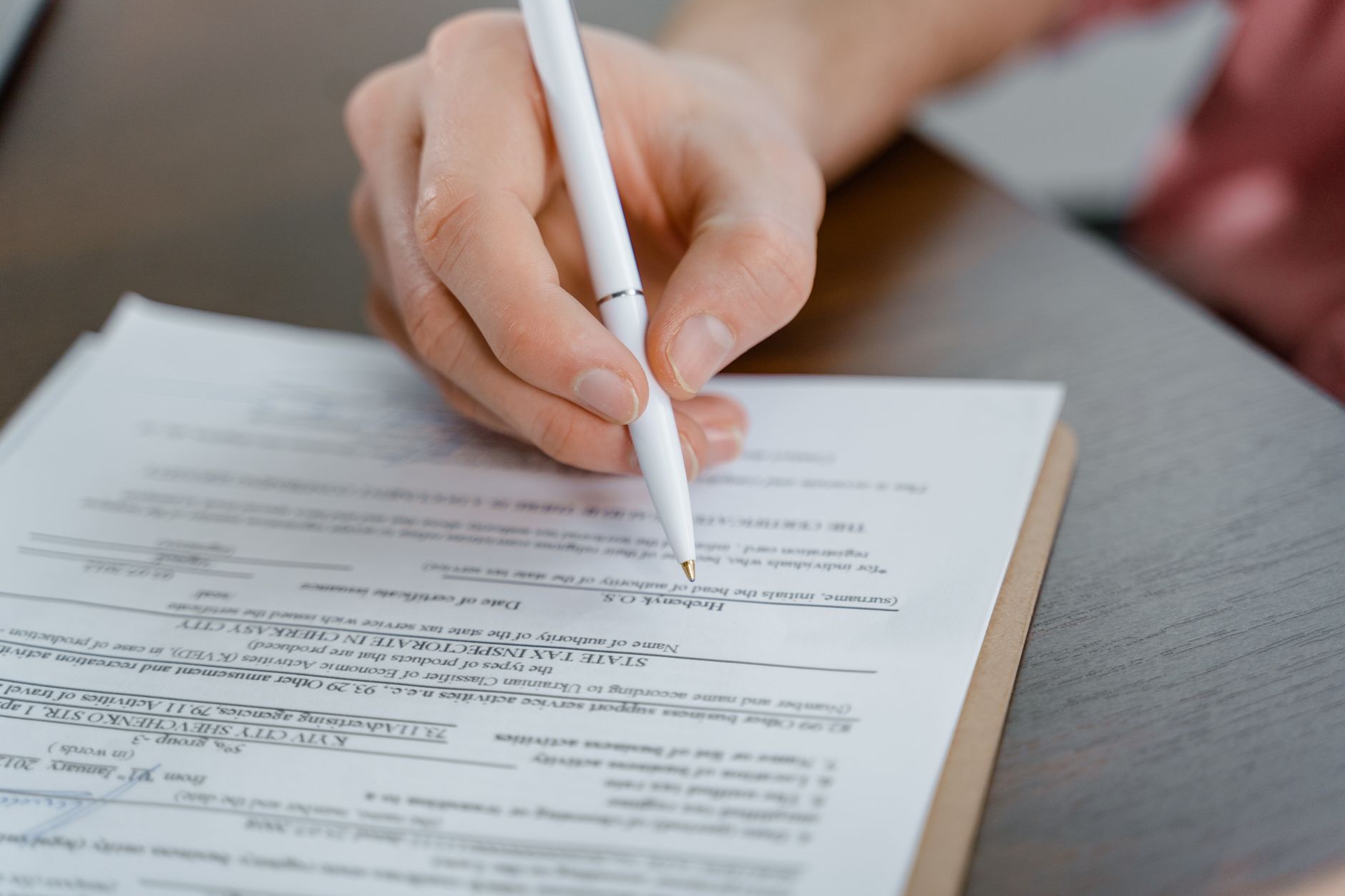 Person reviewing mortgage documents at home — learning how to read a mortgage statement uk